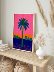 Vibrant palm tree poster with green trunk and blue/green dotted leaves against a bright pink sky, orange hills, and dark blue ground with orange flecks. - Image 4
