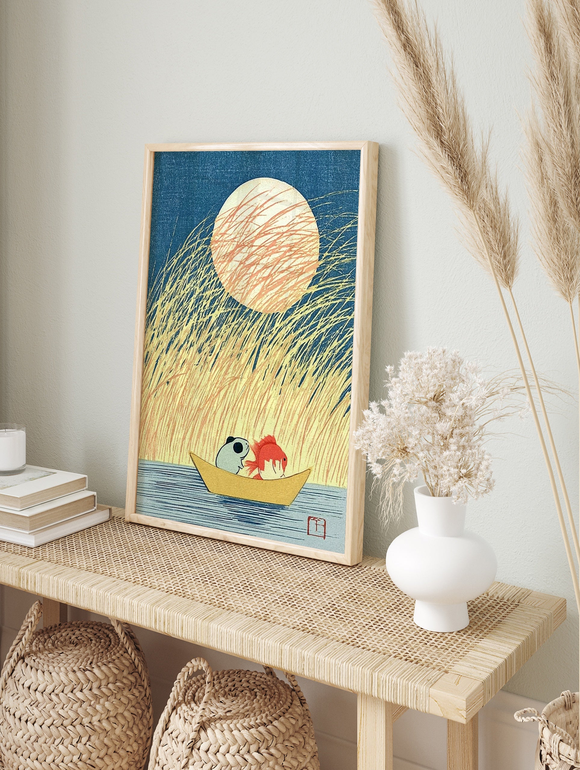 Illustration of a panda and goldfish in a boat under a large moon with tall grass, Japanese, in an alternate framed mockup