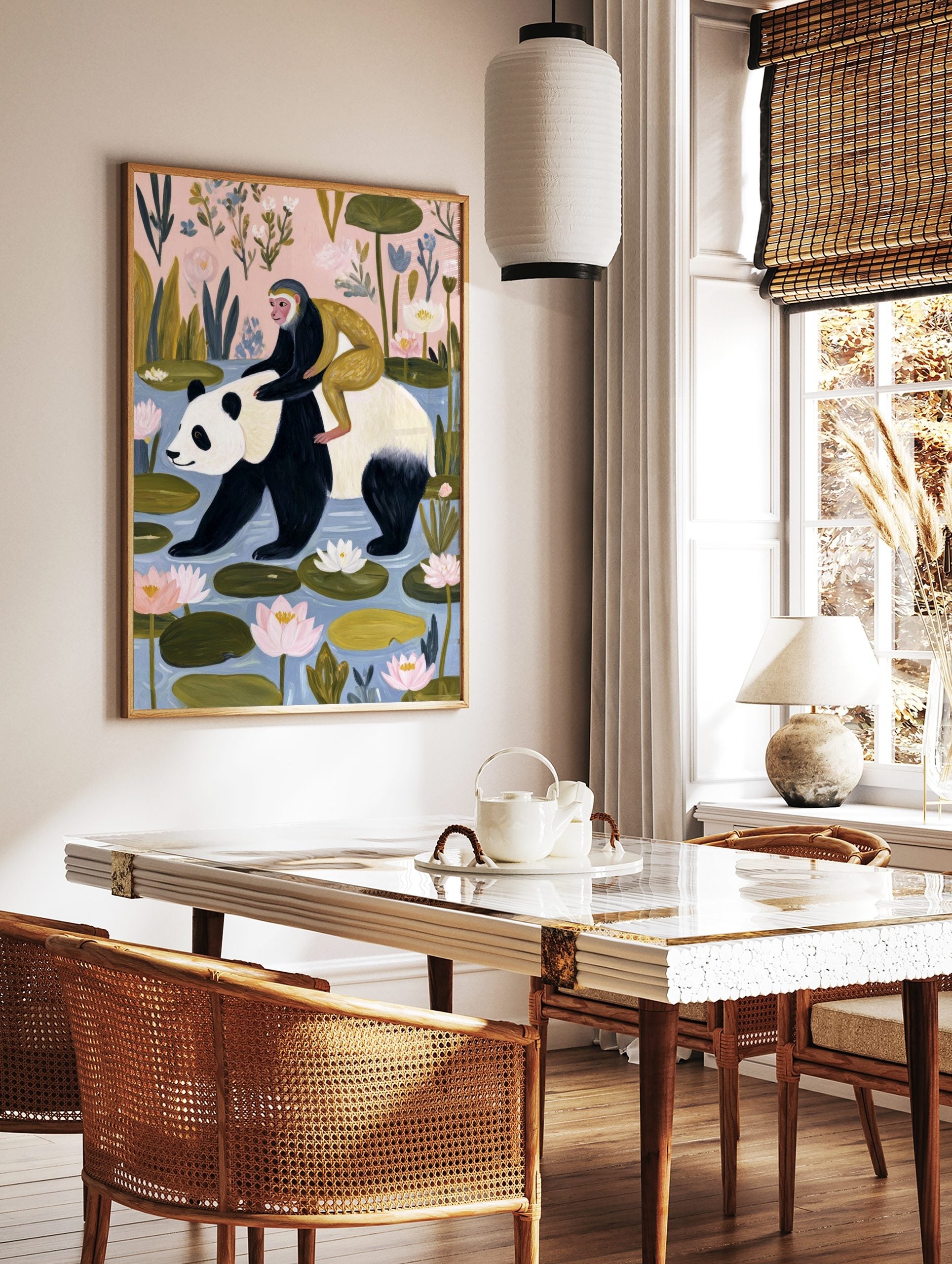 Illustrative print of a panda walking in water with a monkey on its back, surrounded by water lilies, in a styled room mockup