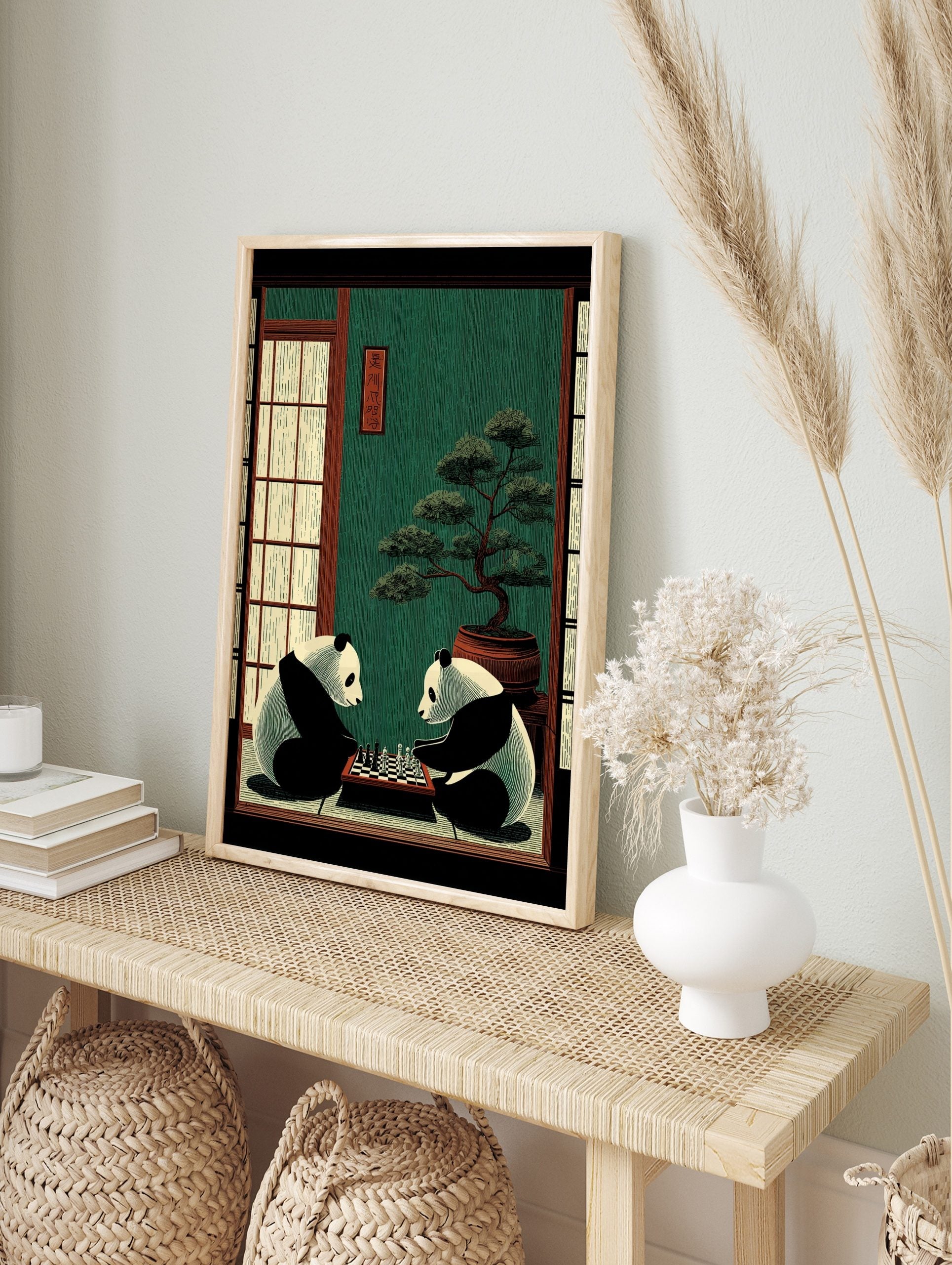 Illustrative print of two pandas playing chess in a traditional Japanese room with a bonsai, in an alternate framed mockup