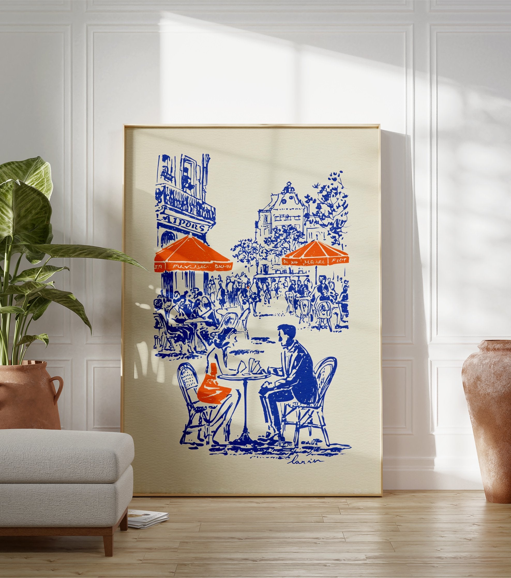 Illustrated blue and orange cafe poster depicting a couple at a Parisian street cafe with buildings in the background. - Image 3