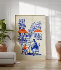 Illustrated blue and orange cafe poster depicting a couple at a Parisian street cafe with buildings in the background. - Image 3