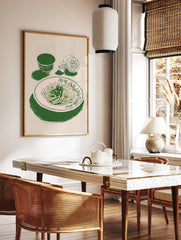Green pasta wall art illustration featuring spaghetti on a plate with sliced lemons and a bowl on a light background. - Image 3