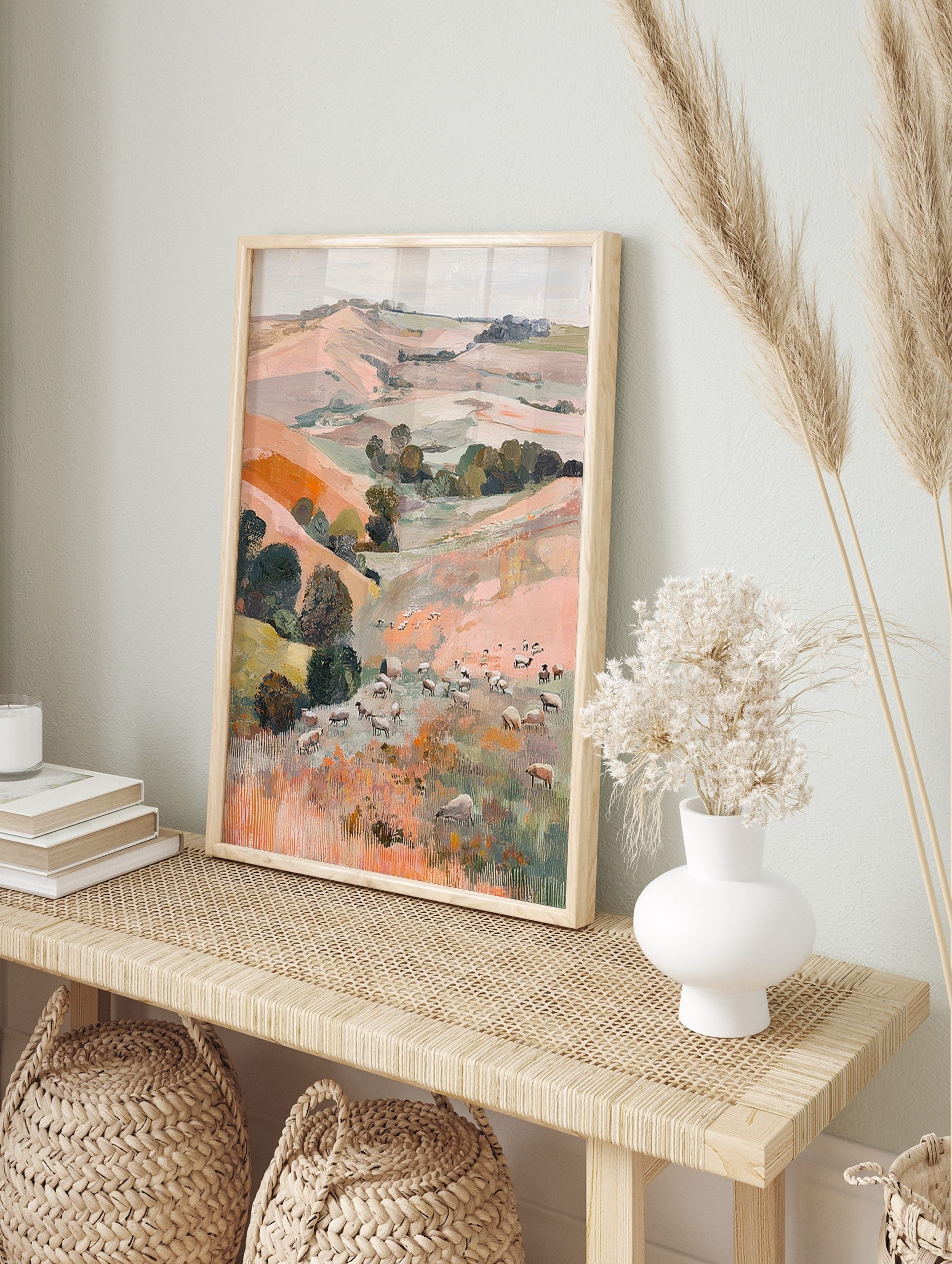 Painterly landscape art print of a pastoral valley with rolling hills, trees, and many, in an alternate framed mockup