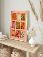 Grid of nine multi-color pattern art designs with abstract, botanical, and animal prints in warm tones on a peach background. - Image 3