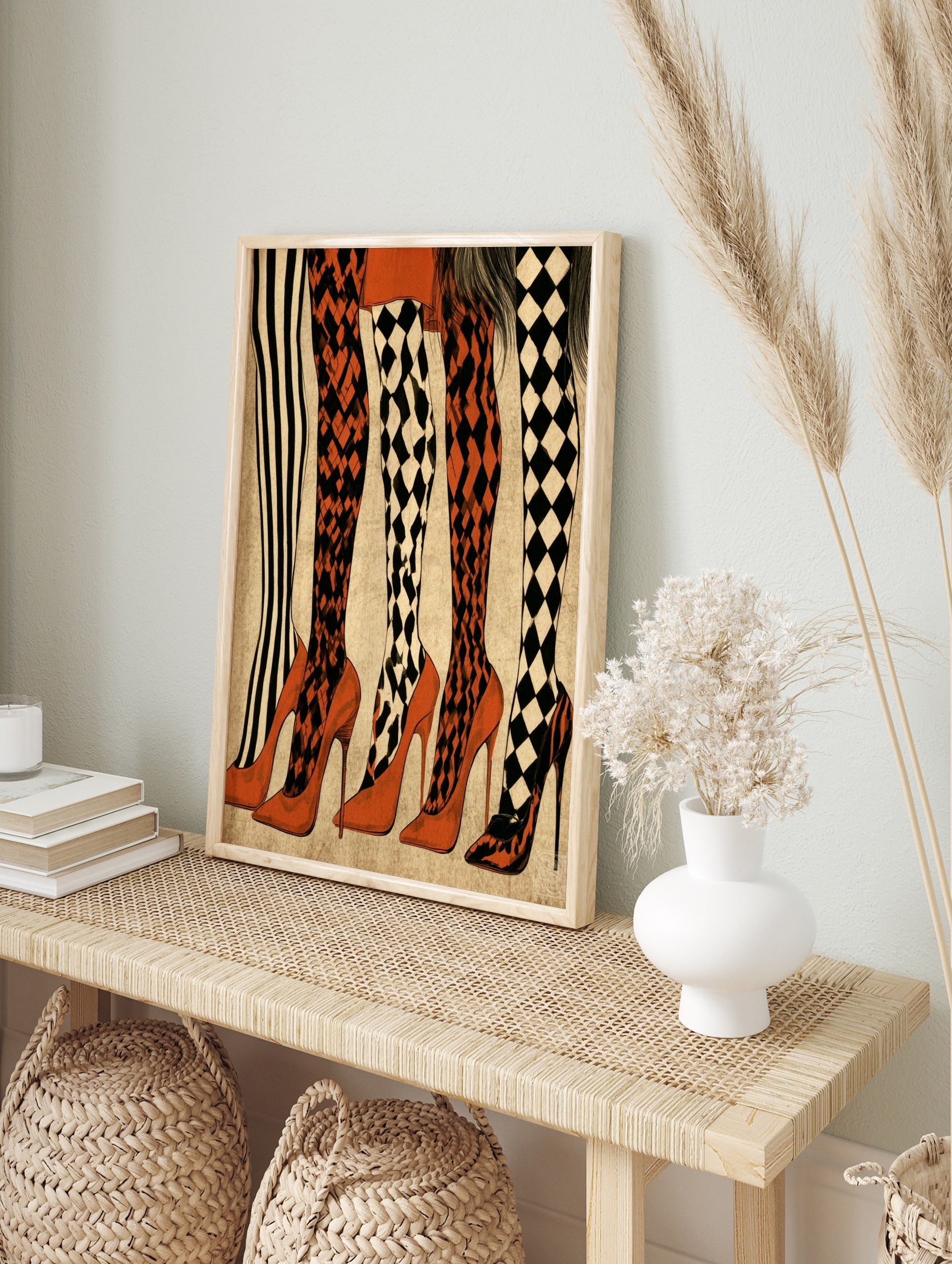 Fashion illustration of five pairs of legs wearing striped, diamond, and harlequin patterned, in an alternate framed mockup