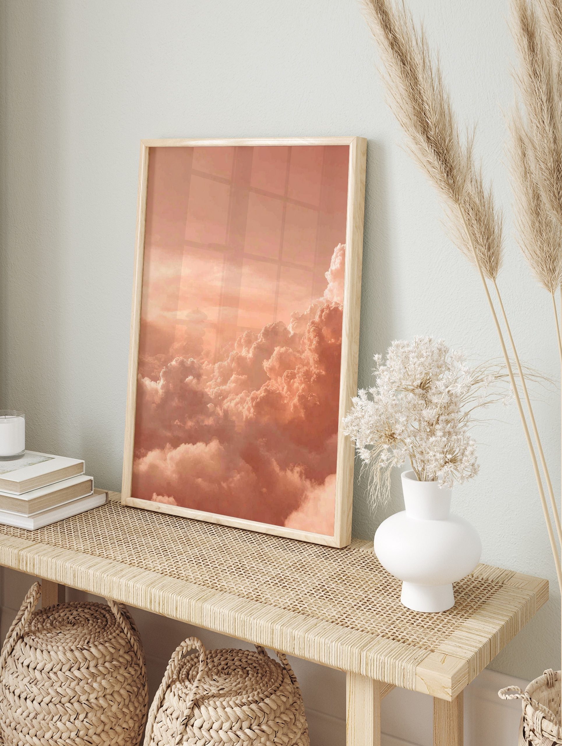 Peach and orange cumulus clouds filling the sky at sunset, a serene and dreamy photographic, in an alternate framed mockup