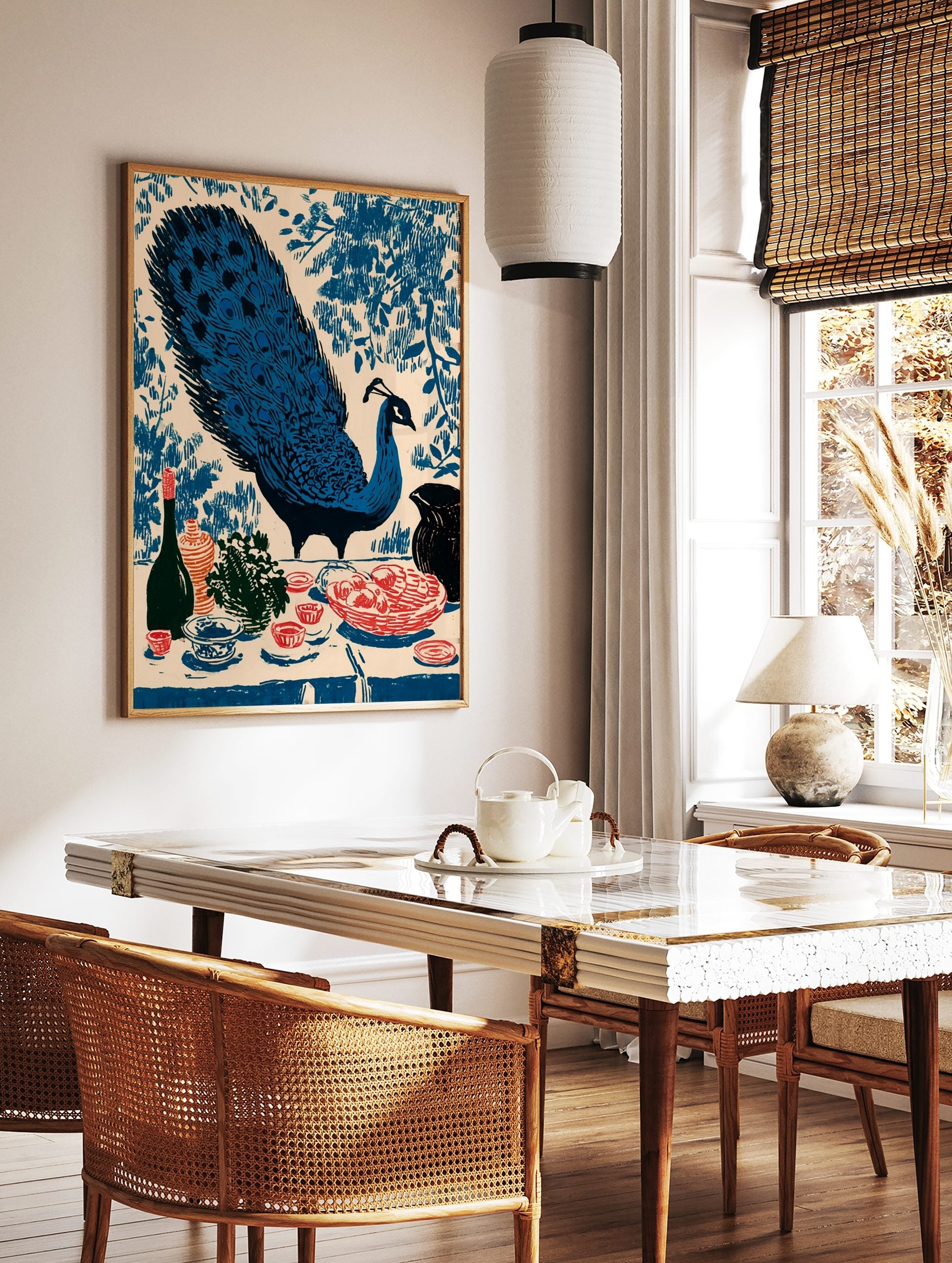 Illustrative blue peacock with fanned tail and still life with fruit, bottle, and vase on a table, in a styled room mockup