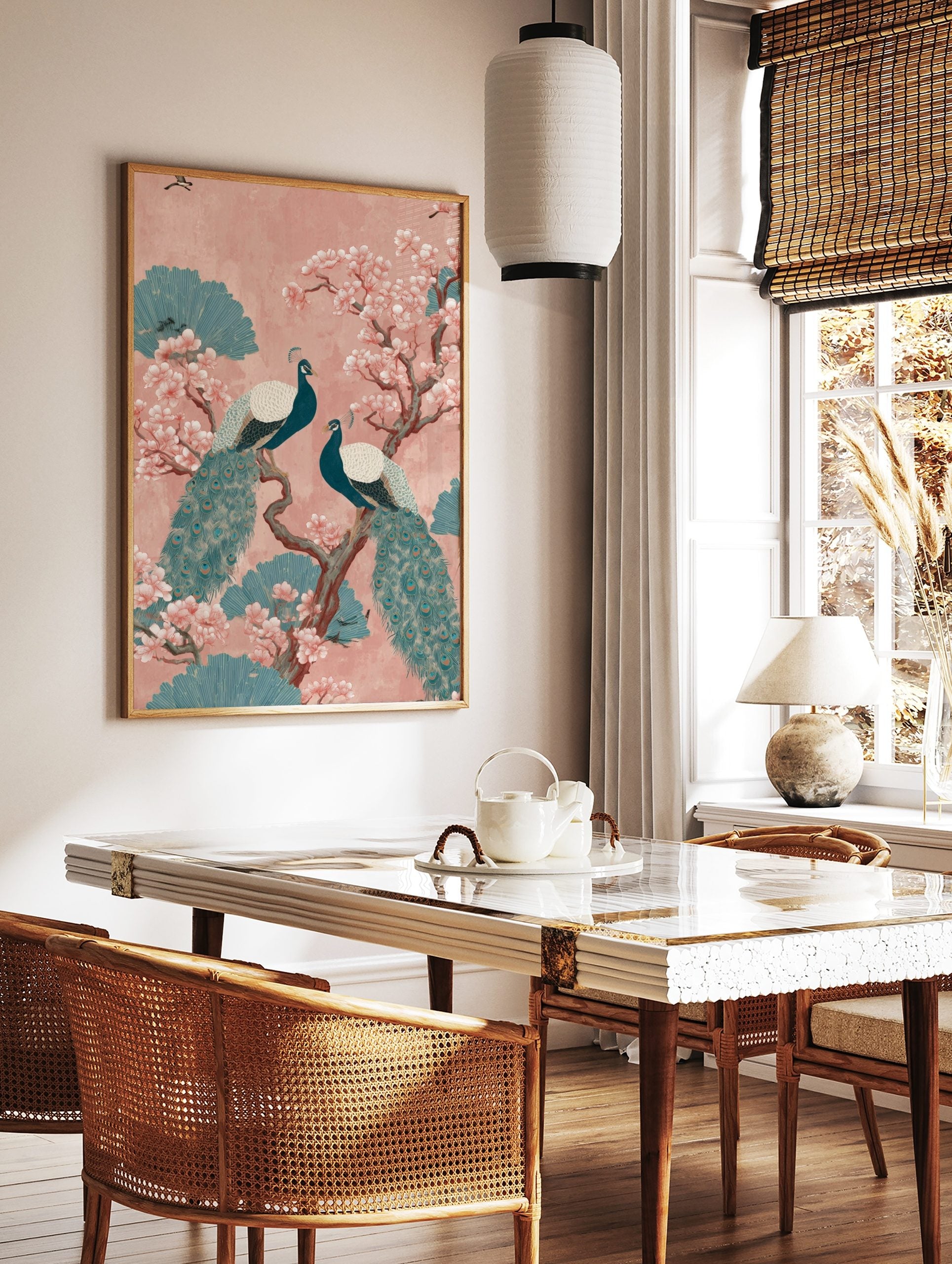 Two teal peacocks on a brown branch with pink cherry blossoms and teal foliage on a pink background, in a styled room mockup
