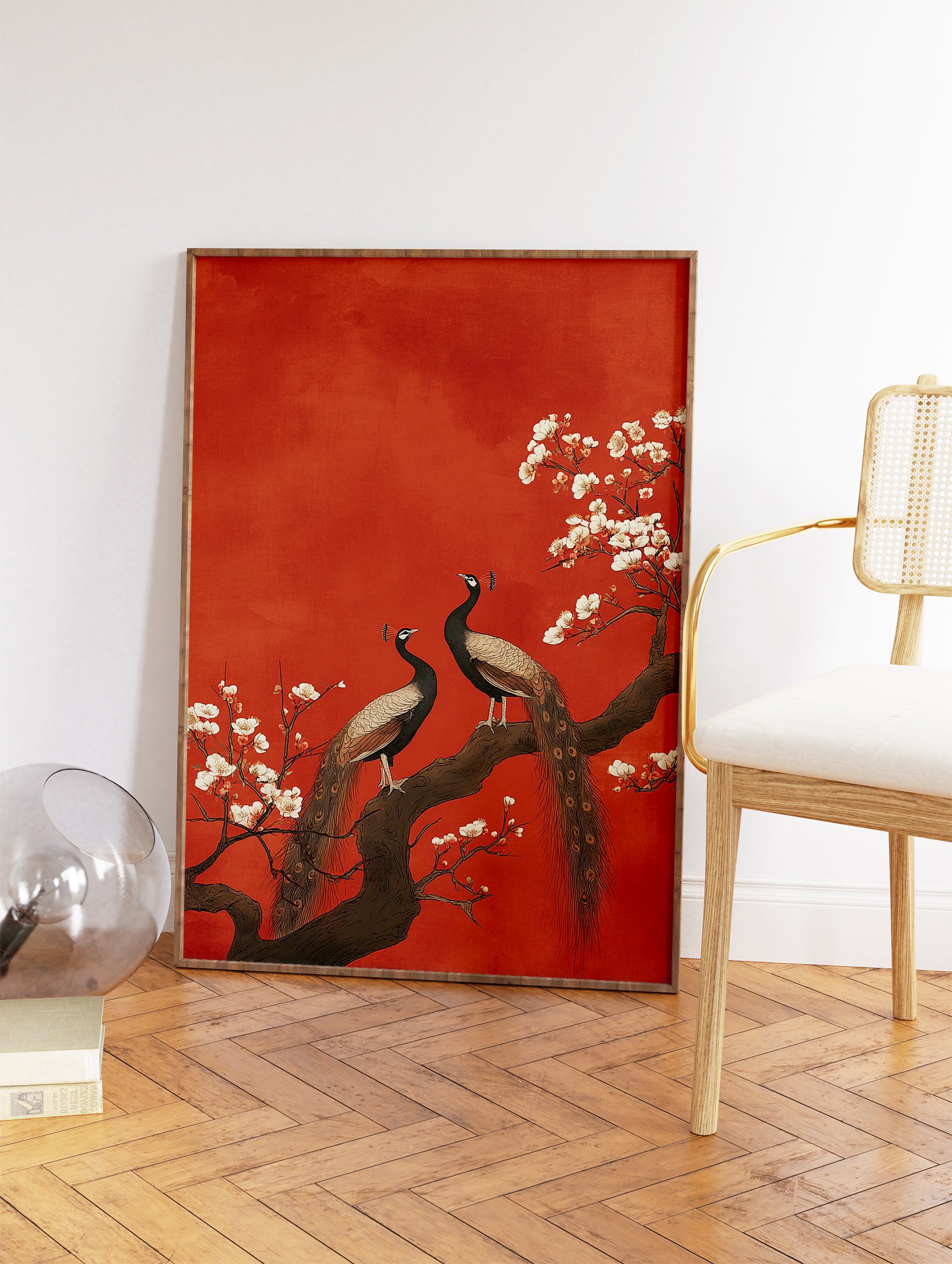 Two peacocks perch on a flowering branch with white blossoms against a textured red background in a traditional art style. - Image 2