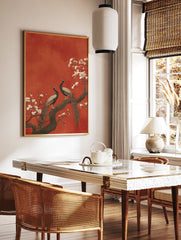 Two peacocks perch on a flowering branch with white blossoms against a textured red background in a traditional art style. - Image 3
