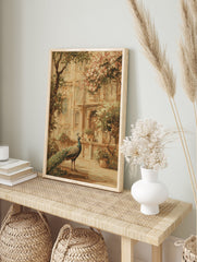Elegant peacock wall art illustration with a long tail in front of a classical building with trees and pink flowers. - Image 3