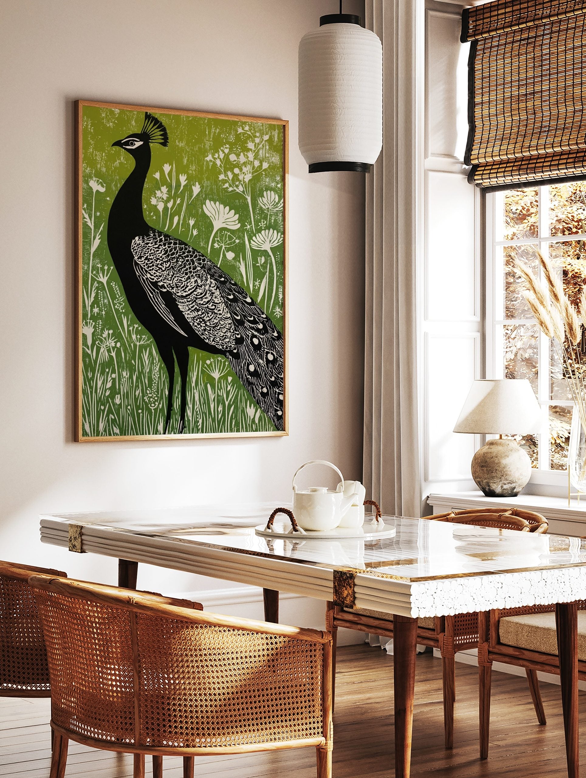 Black peacock silhouette with white details against a vibrant green textured background with white, in a styled room mockup