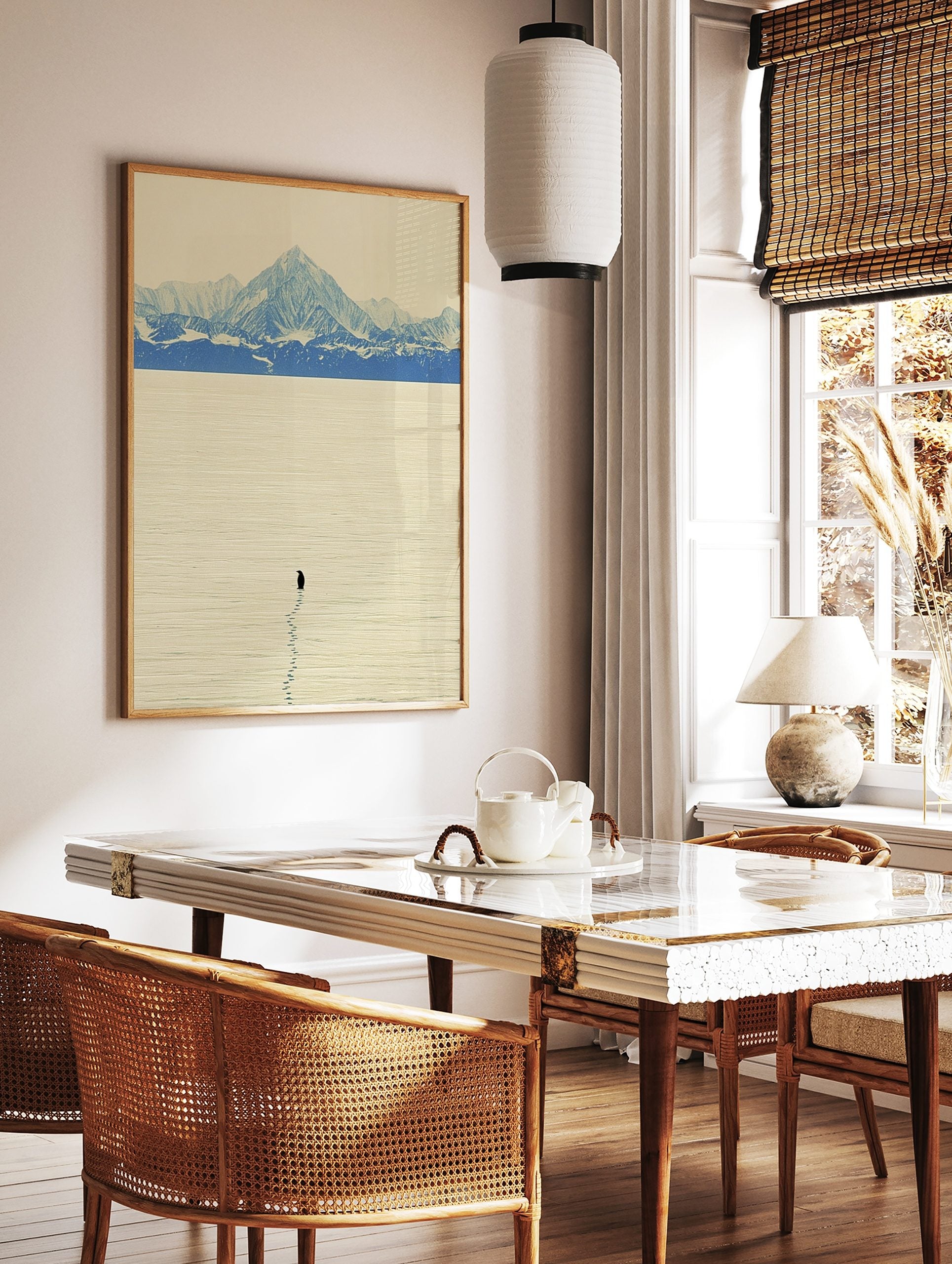 Single penguin with footprints on vast snow plain, blue mountains in background, minimalist, in a styled room mockup