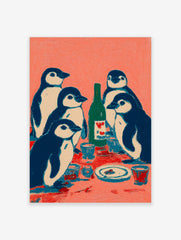 Illustrative print of five navy and white penguins at a table with a green bottle and cups on a coral background