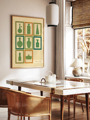 Retro perfume bottle wall art with green silhouettes in a grid, featuring vintage cosmetic glass, in a styled room mockup