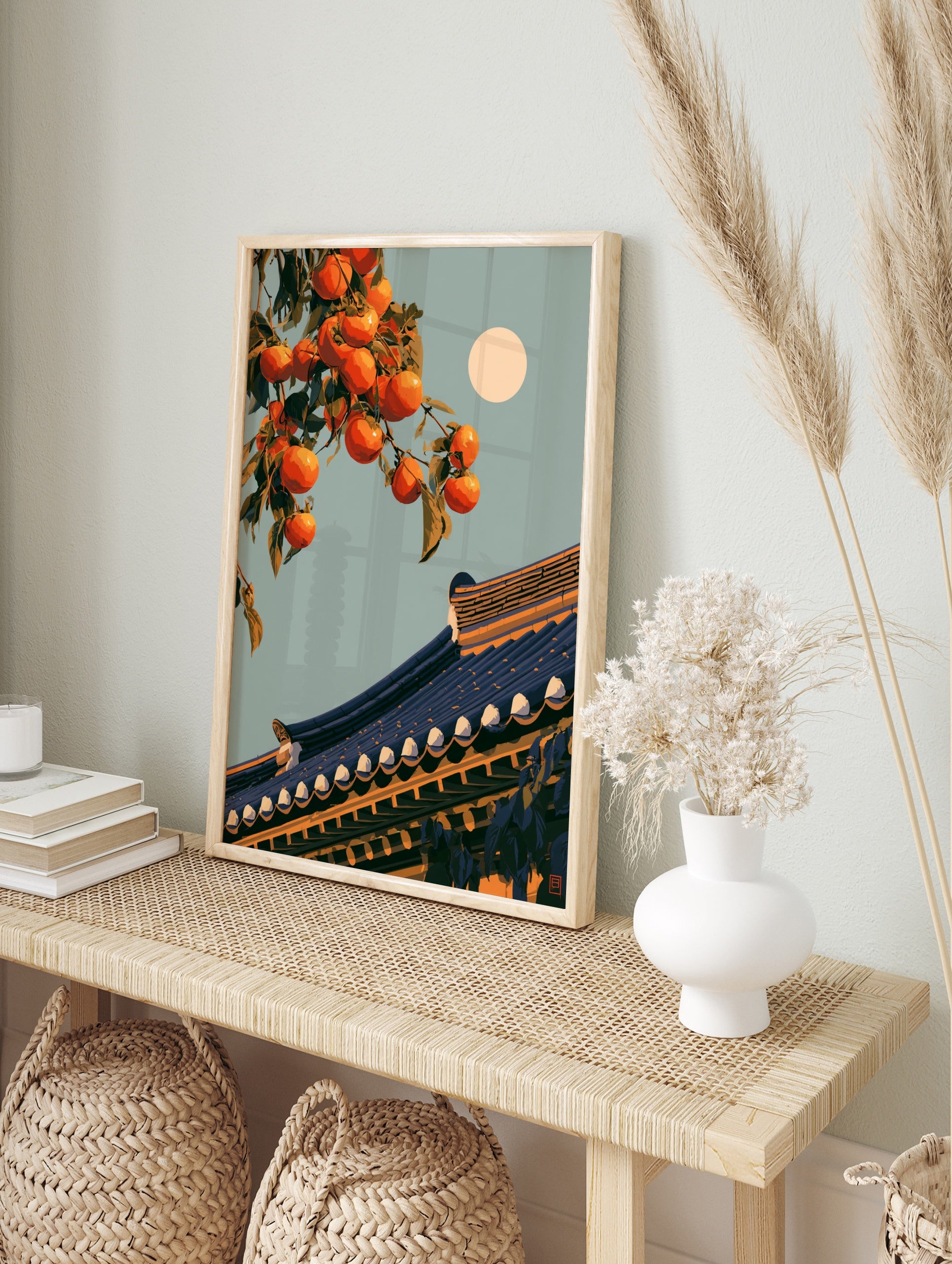 Illustrative orange persimmon fruit on a branch above a traditional tiled roof with a full, in an alternate framed mockup