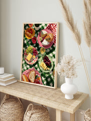 Vibrant picnic wall art illustration with cheese, grapes, bread, and drinks on a green checkered tablecloth - Image 3