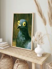 Close-up illustrative painting of a pigeon with large yellow eyes against a dark, textured, in an alternate framed mockup
