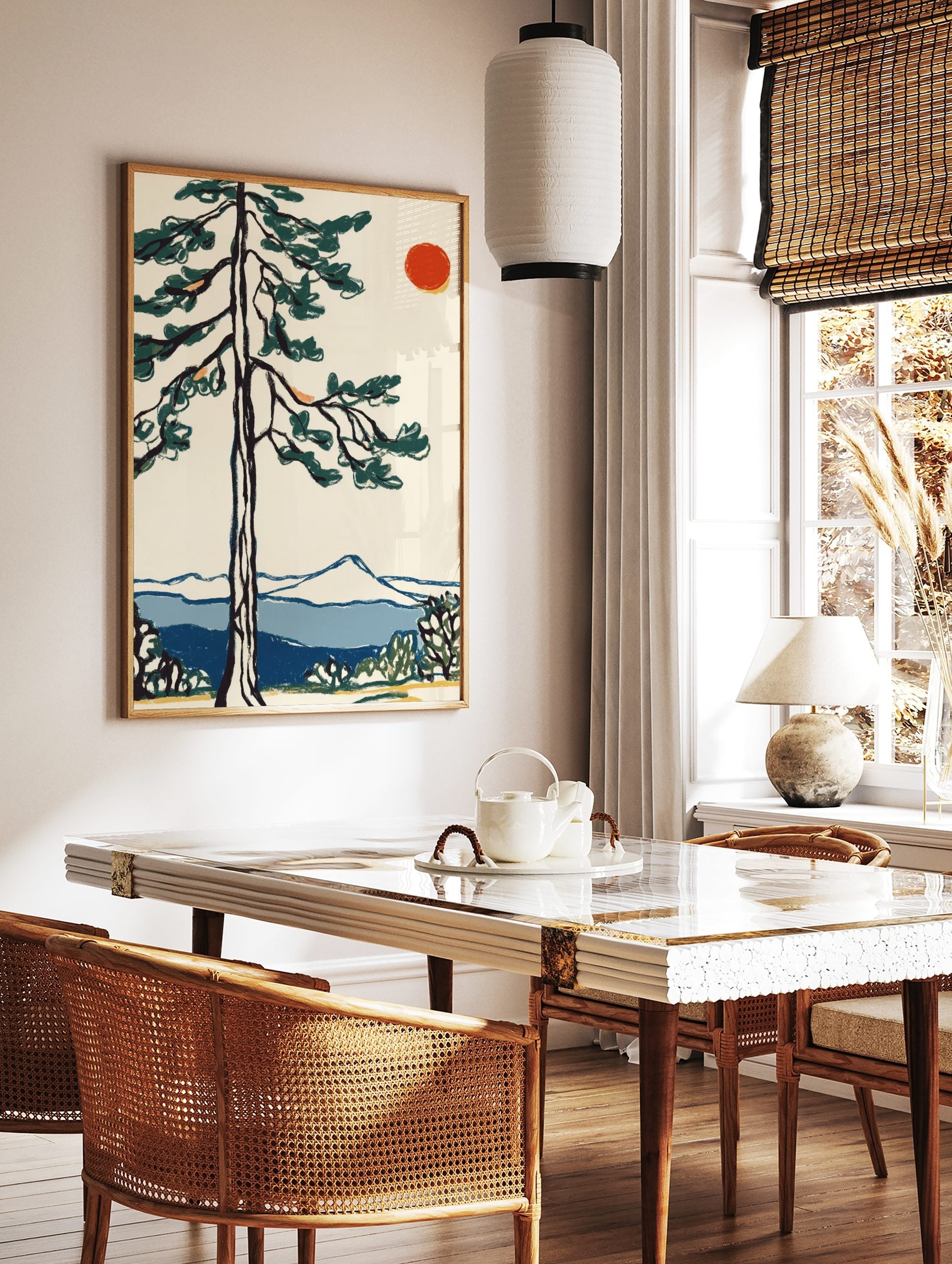 Illustrative pine tree with dark green foliage, red sun, blue mountains, and water in a serene, in a styled room mockup