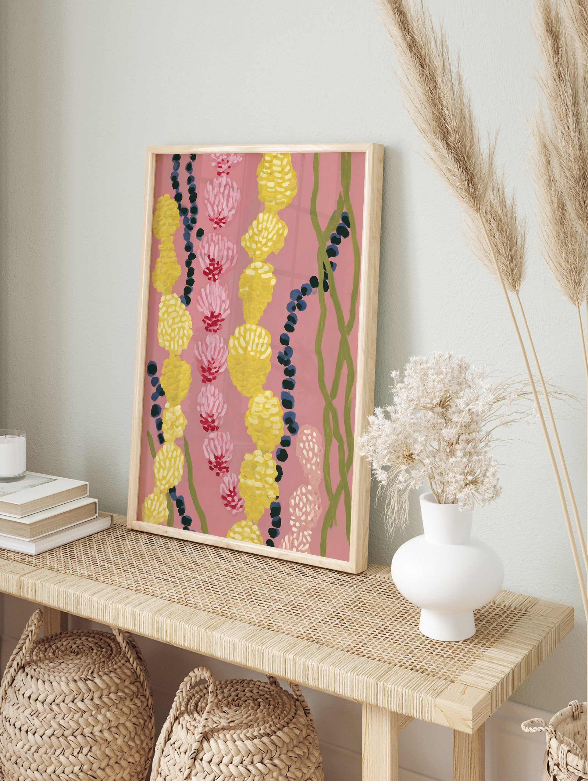 Abstract botanical wall art with pink and yellow clustered flowers, dark blue berries, and green vines on a pink background. - Image 3
