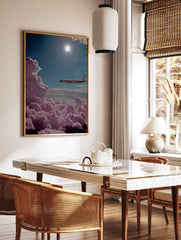 Pink airplane flying above fluffy magenta clouds under a bright blue sky with the sun shining, surreal wall art. - Image 2