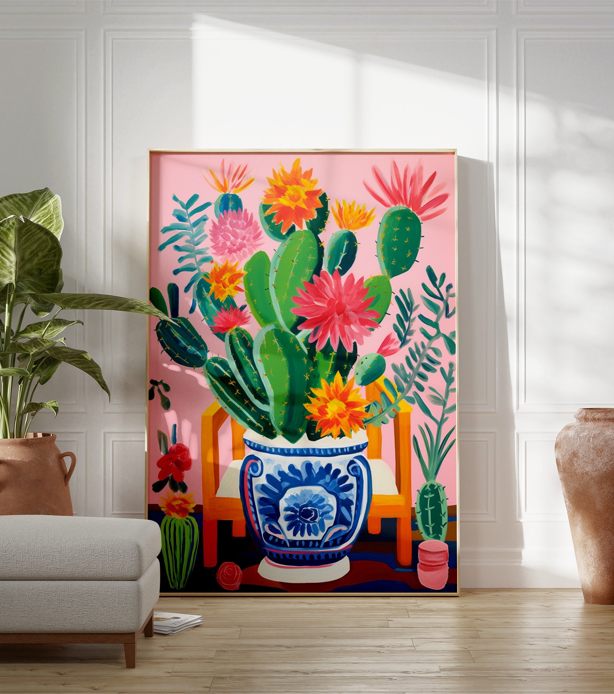 Vibrant pink cactus poster with green cacti and colorful red, orange, and yellow flowers in a blue and white decorative pot on a pink background. - Image 3