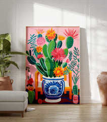 Vibrant pink cactus poster with green cacti and colorful red, orange, and yellow flowers in a blue and white decorative pot on a pink background. - Image 3