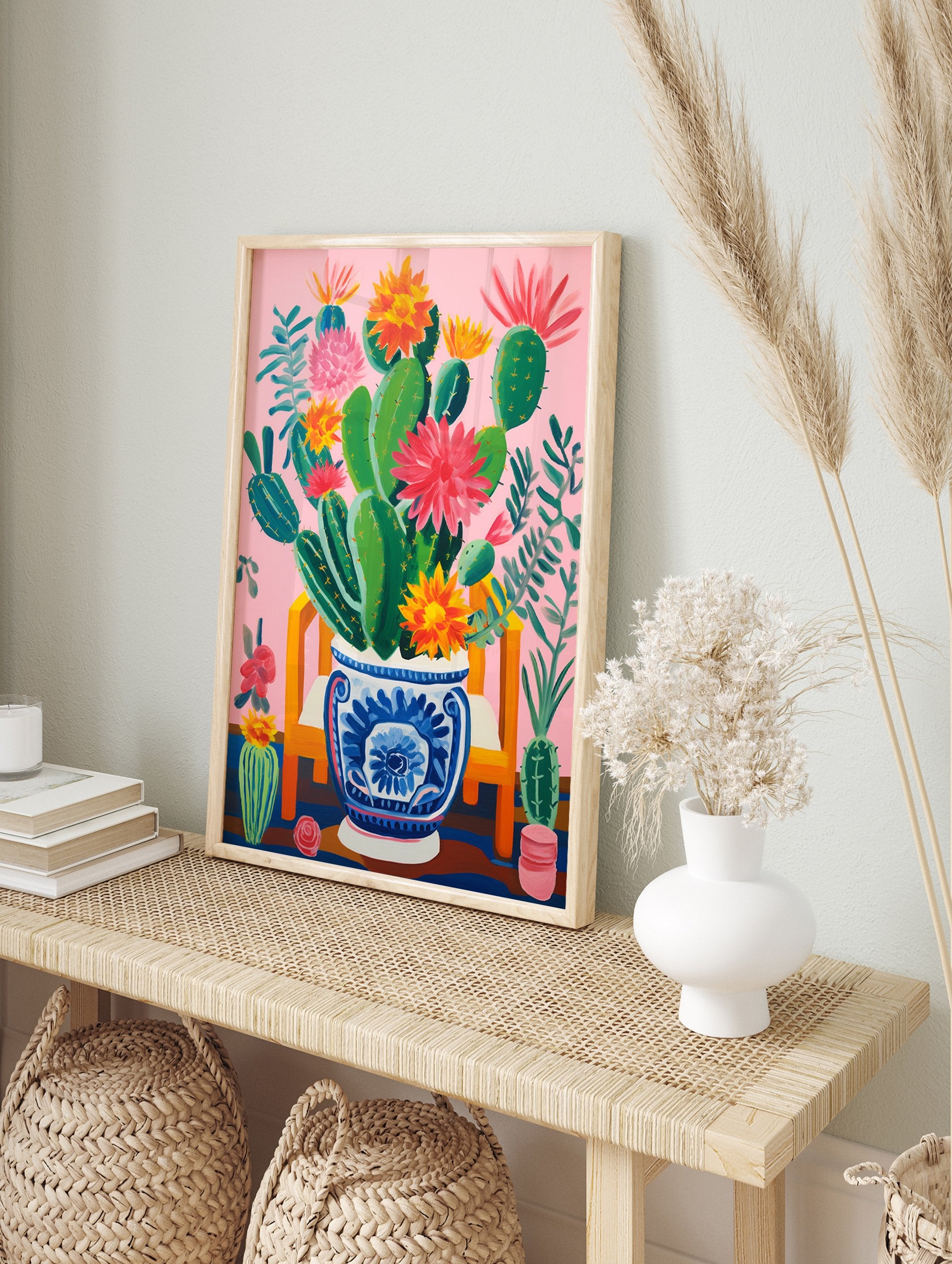 Vibrant pink cactus poster with green cacti and colorful red, orange, and yellow flowers in a blue and white decorative pot on a pink background. - Image 4