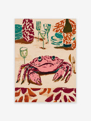 Illustrative wall art print of a pink crab at a dinner table with teal plates, glasses, and a wine bottle
