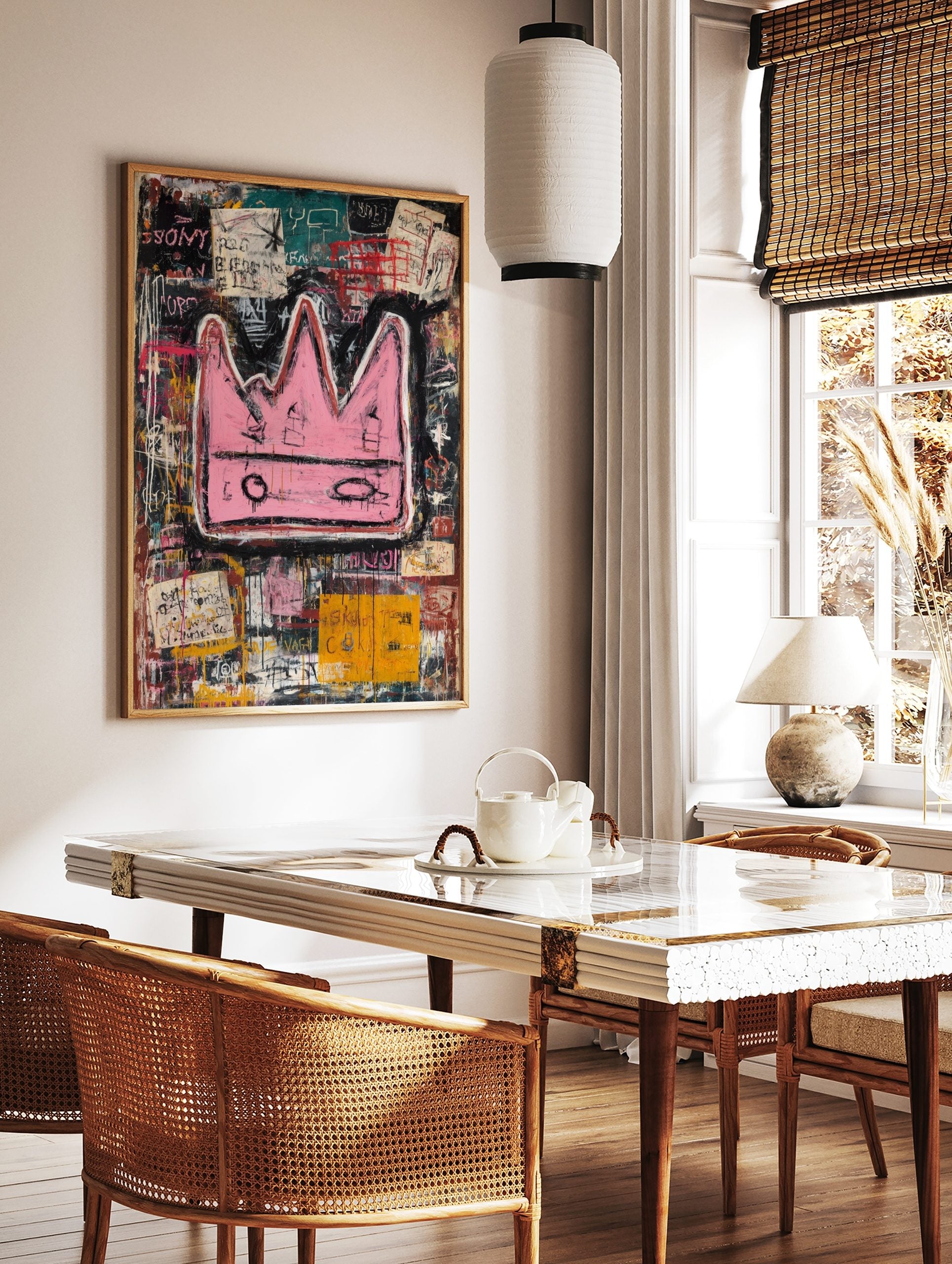 Bold pink crown with black outlines on a layered, abstract background of black, teal, and yellow, in a styled room mockup