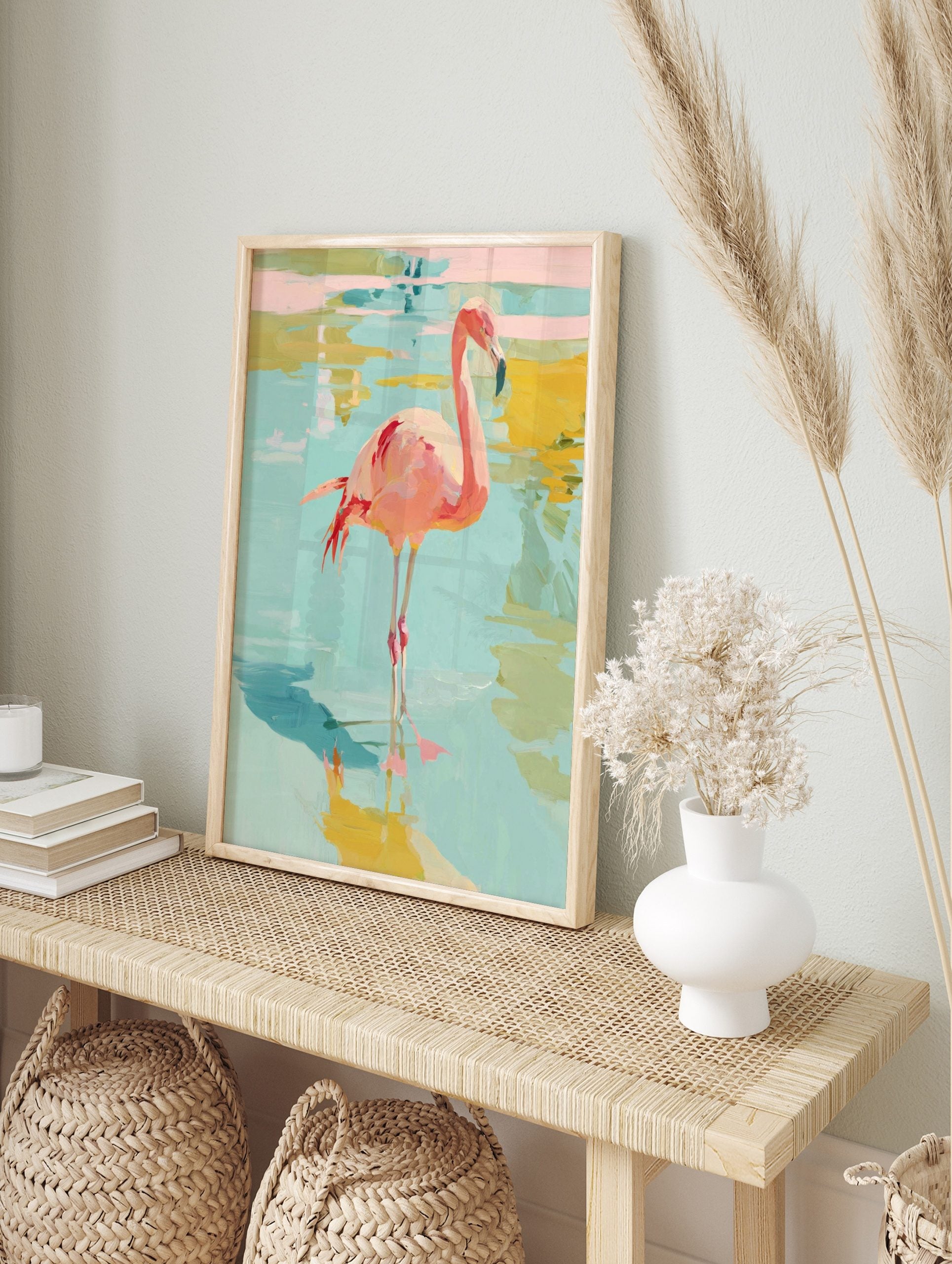 Pink flamingo bird standing in shallow blue and yellow water, painted with abstract, in an alternate framed mockup