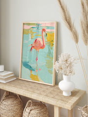 Pink flamingo bird standing in shallow blue and yellow water, painted with abstract, in an alternate framed mockup