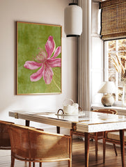 Pink flower botanical illustration with topographical line overlay on a textured green background, in a styled room mockup