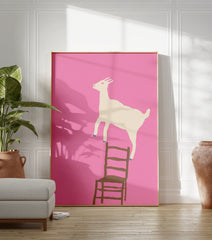 Whimsical pink wall art featuring a white goat standing on a brown chair, rendered in a clean illustration style. - Image 3