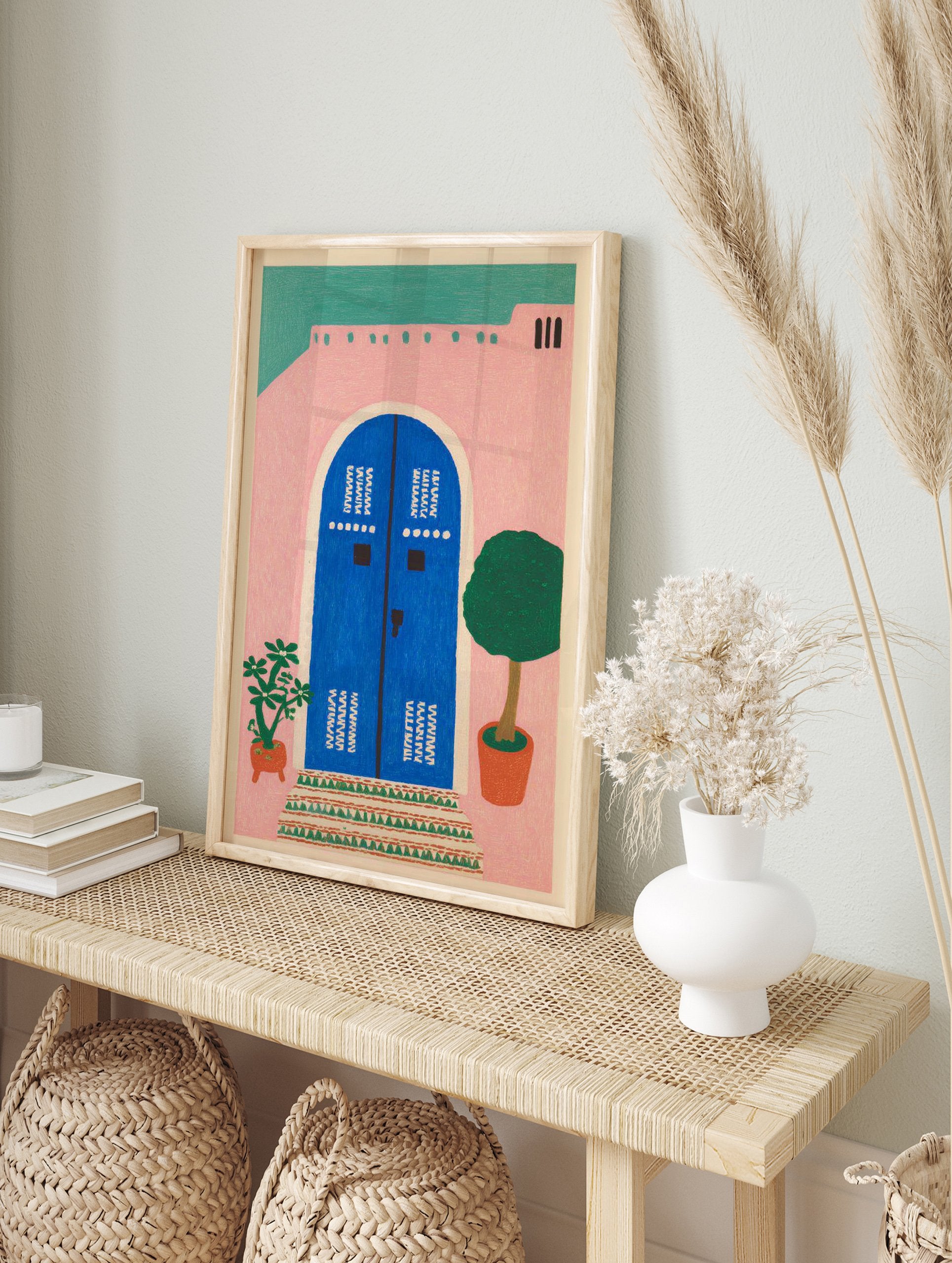 Pink house wall art illustration with a blue arched door, green roof, potted plants, and patterned steps. - Image 3