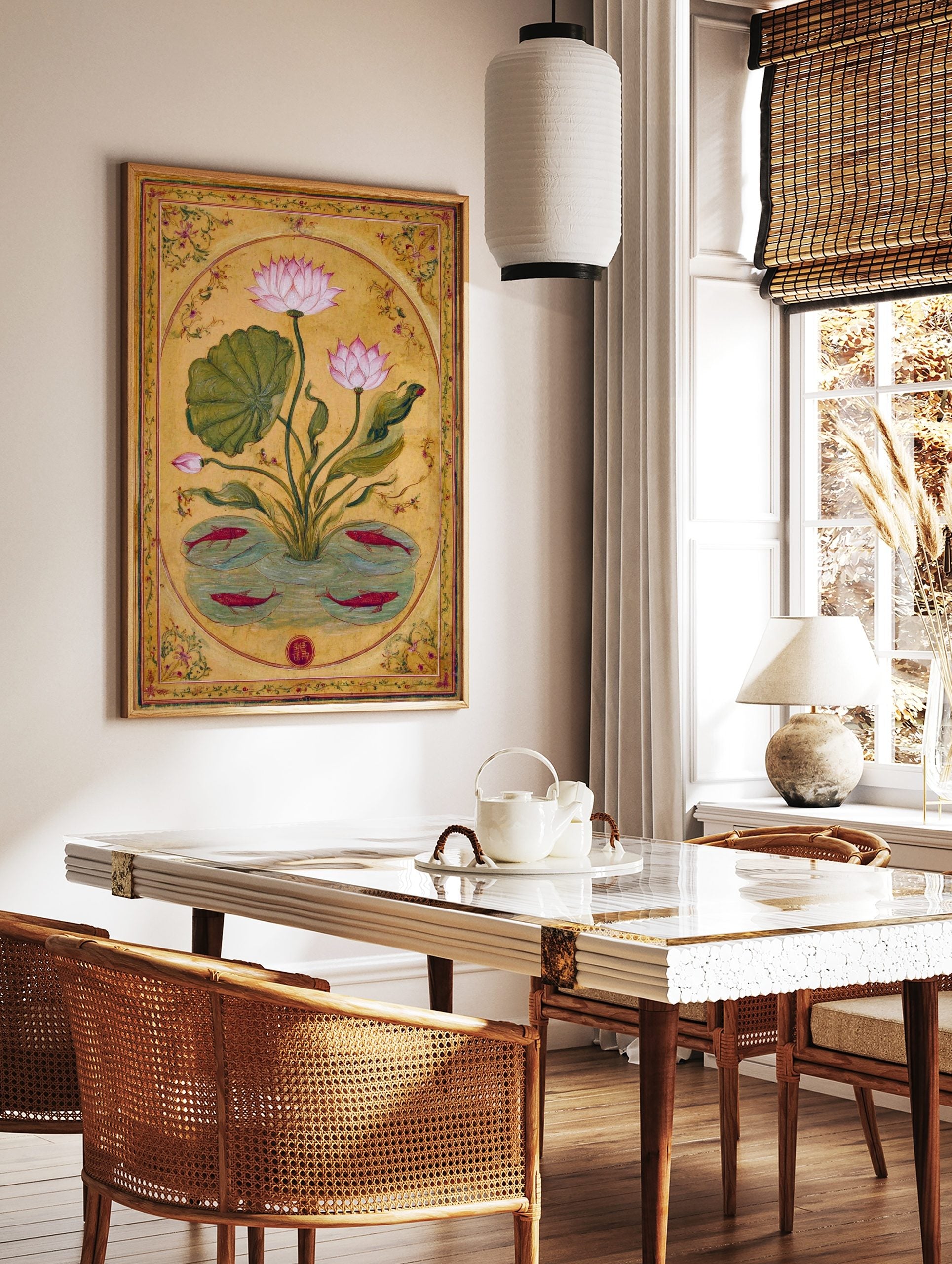 Pink lotus flower and red fish botanical illustration art print in an oval frame on a golden, in a styled room mockup