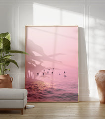 Pink Ocean Surfer Poster featuring multiple surfers waiting in calm, pink-hued water with sun reflections. - Image 3