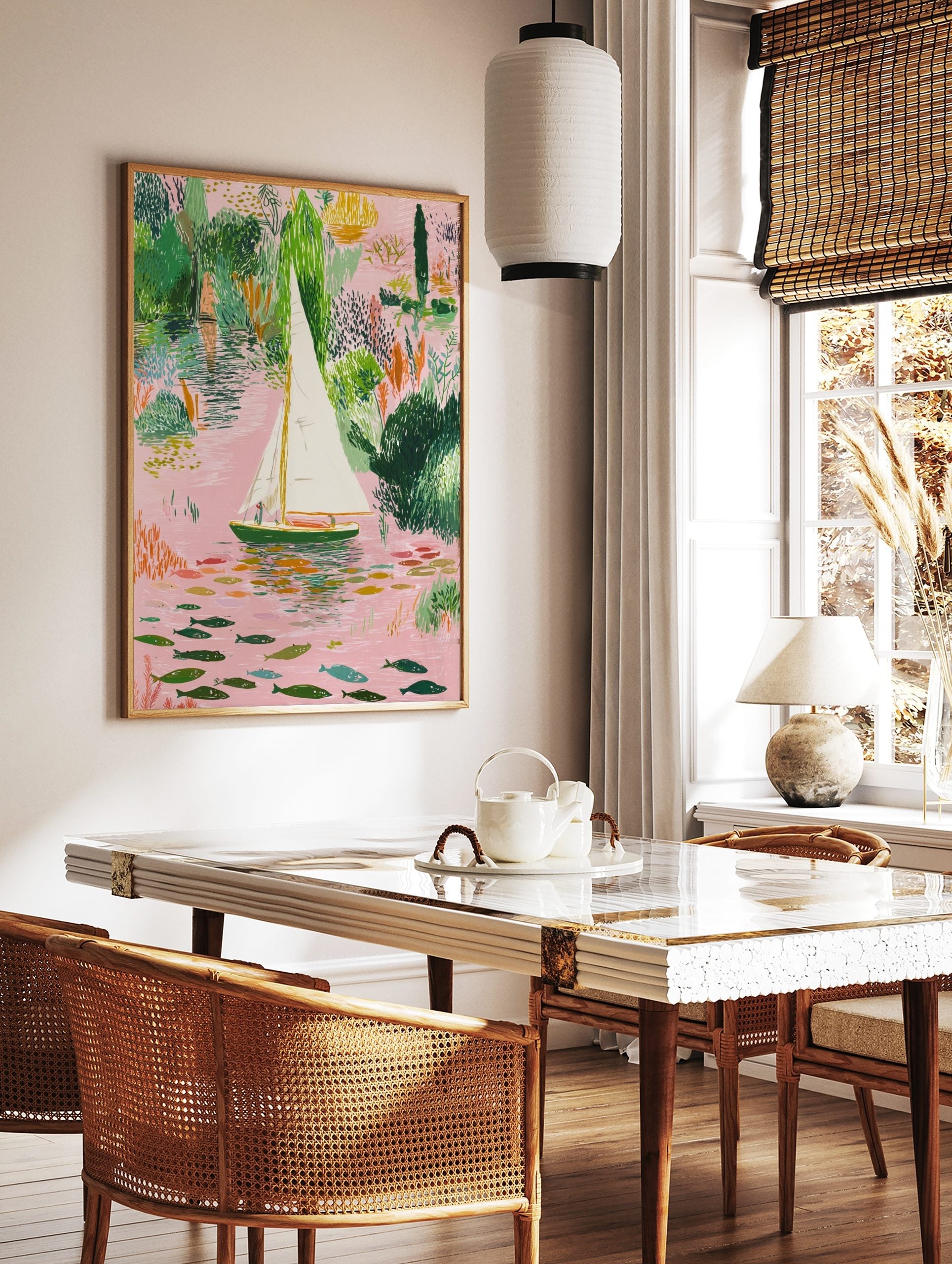 Illustrative sailboat on a pink river with green foliage and colourful fish art print, in a styled room mockup