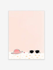 Illustrative print of a pink sun hat, black sunglasses, and red starfish on sand with a peach background