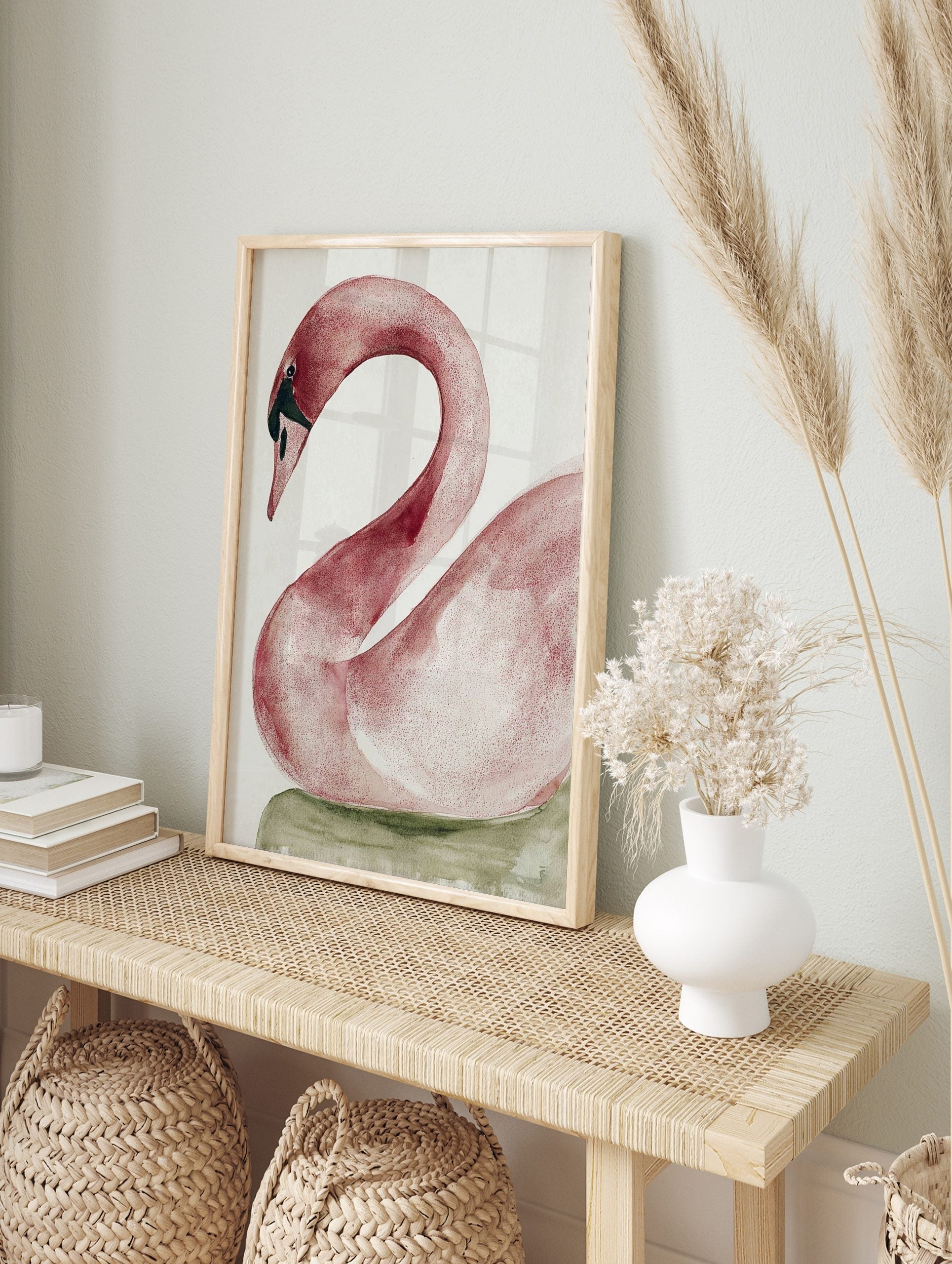 Pink swan watercolour art print with curved neck and black beak on a white background with, in an alternate framed mockup
