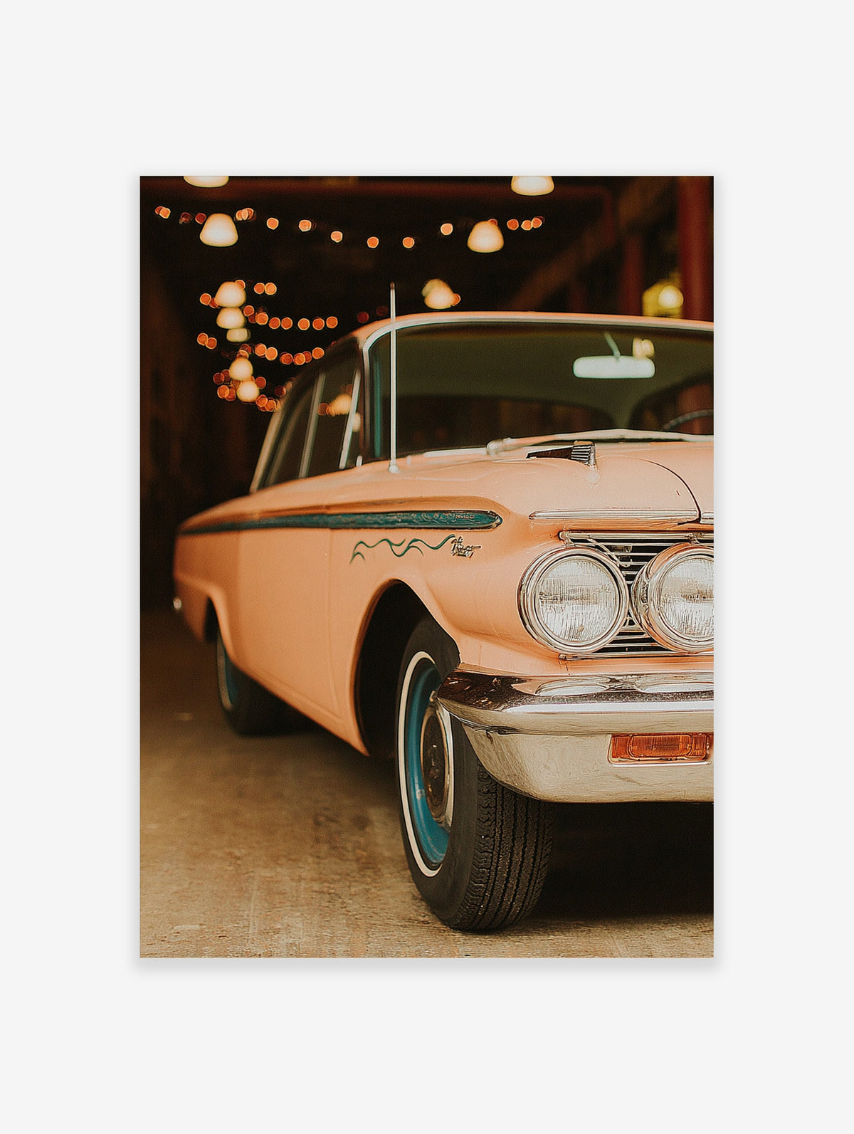 Peach pink vintage car poster with chrome bumper, blue wheels, and warm string lights in background