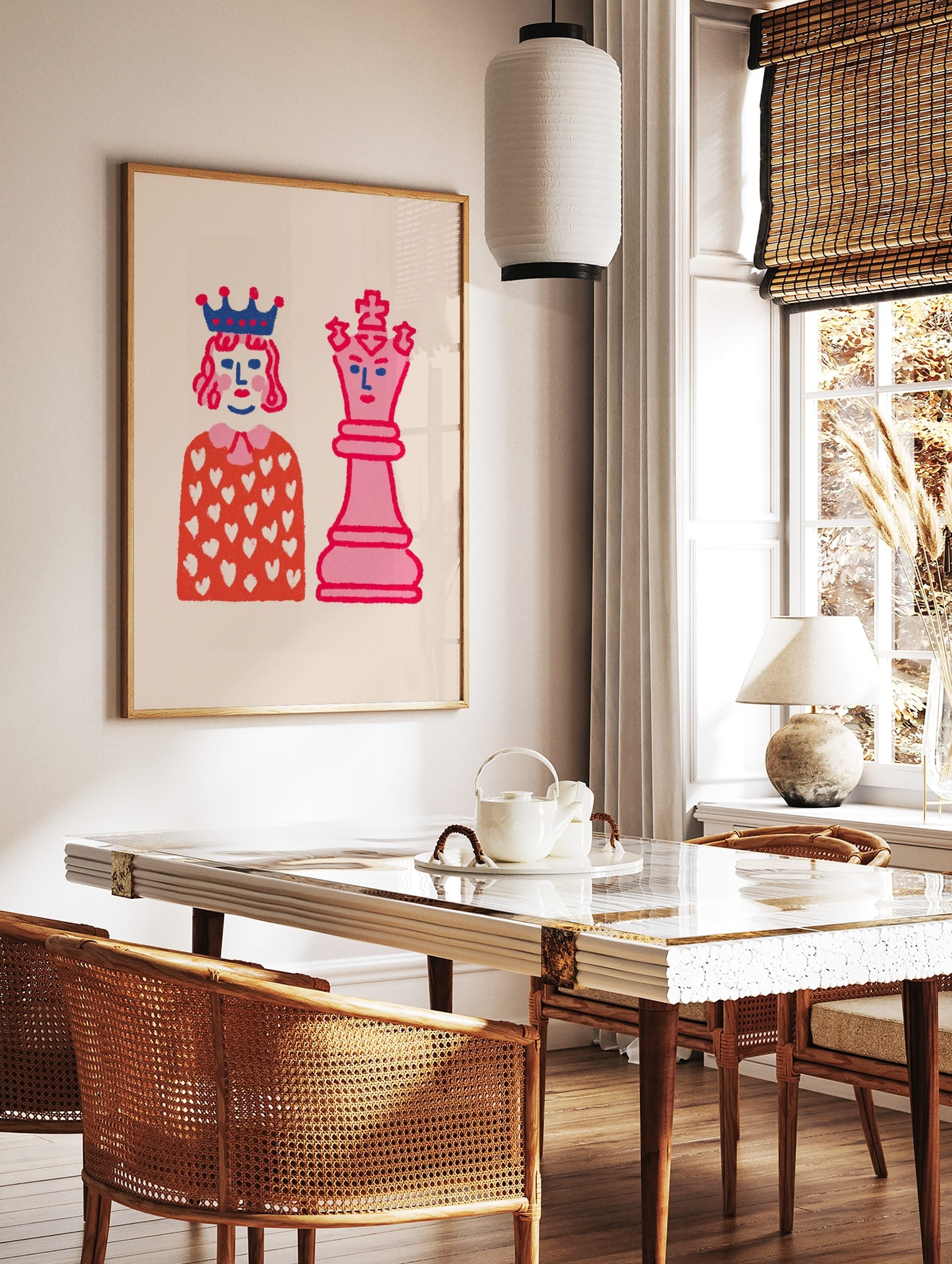 Playful illustrative wall art featuring a pink chess queen and a crowned figure on a light, in a styled room mockup