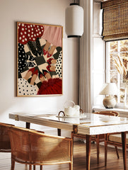 Illustrative fashion print of women in polka dot skirts and heels standing in a circle on a, in a styled room mockup