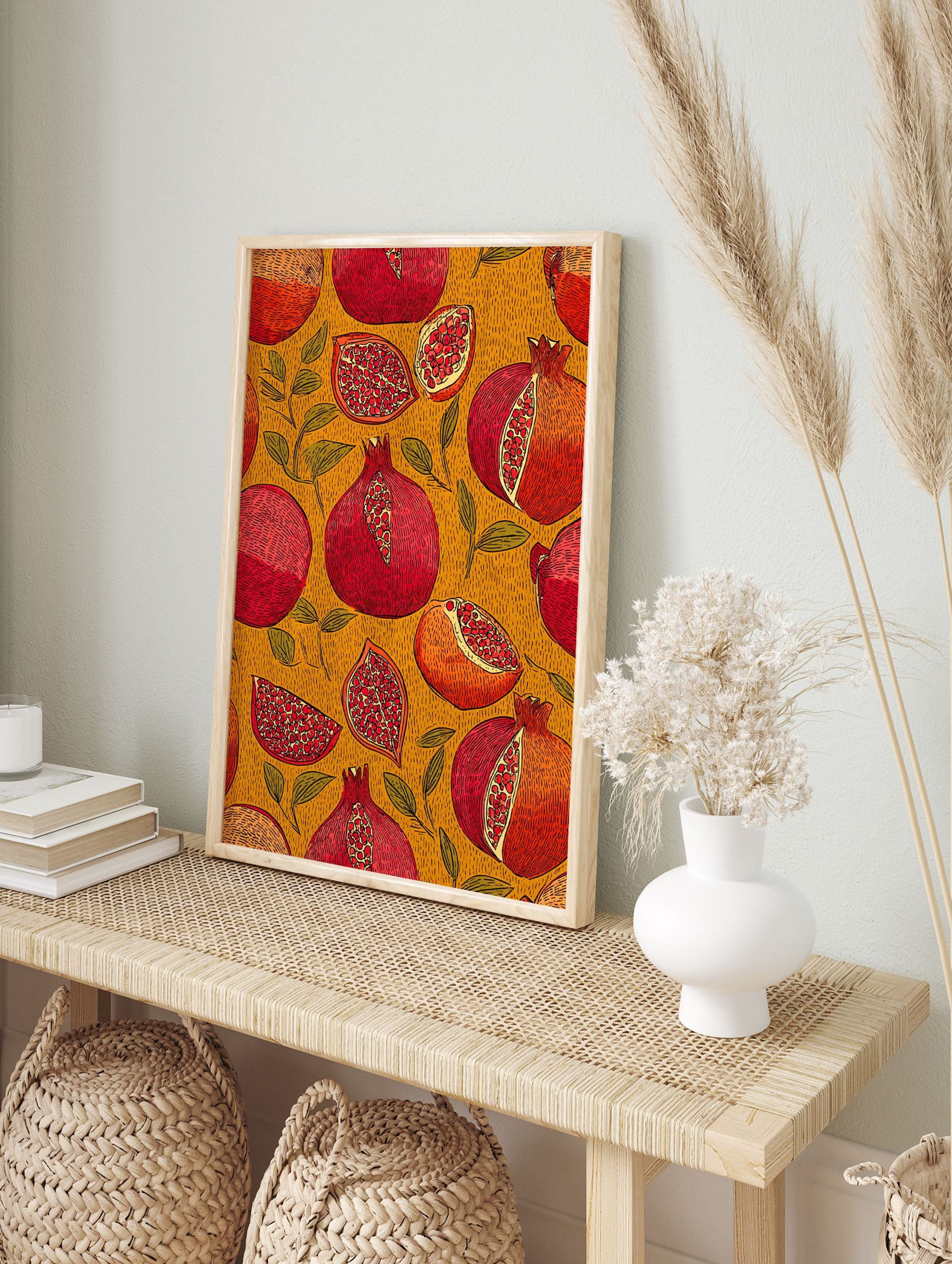 Illustrative Pomegranate wall art print with whole and sliced red and orange pomegranates and green leaves on a textured yellow background. - Image 3