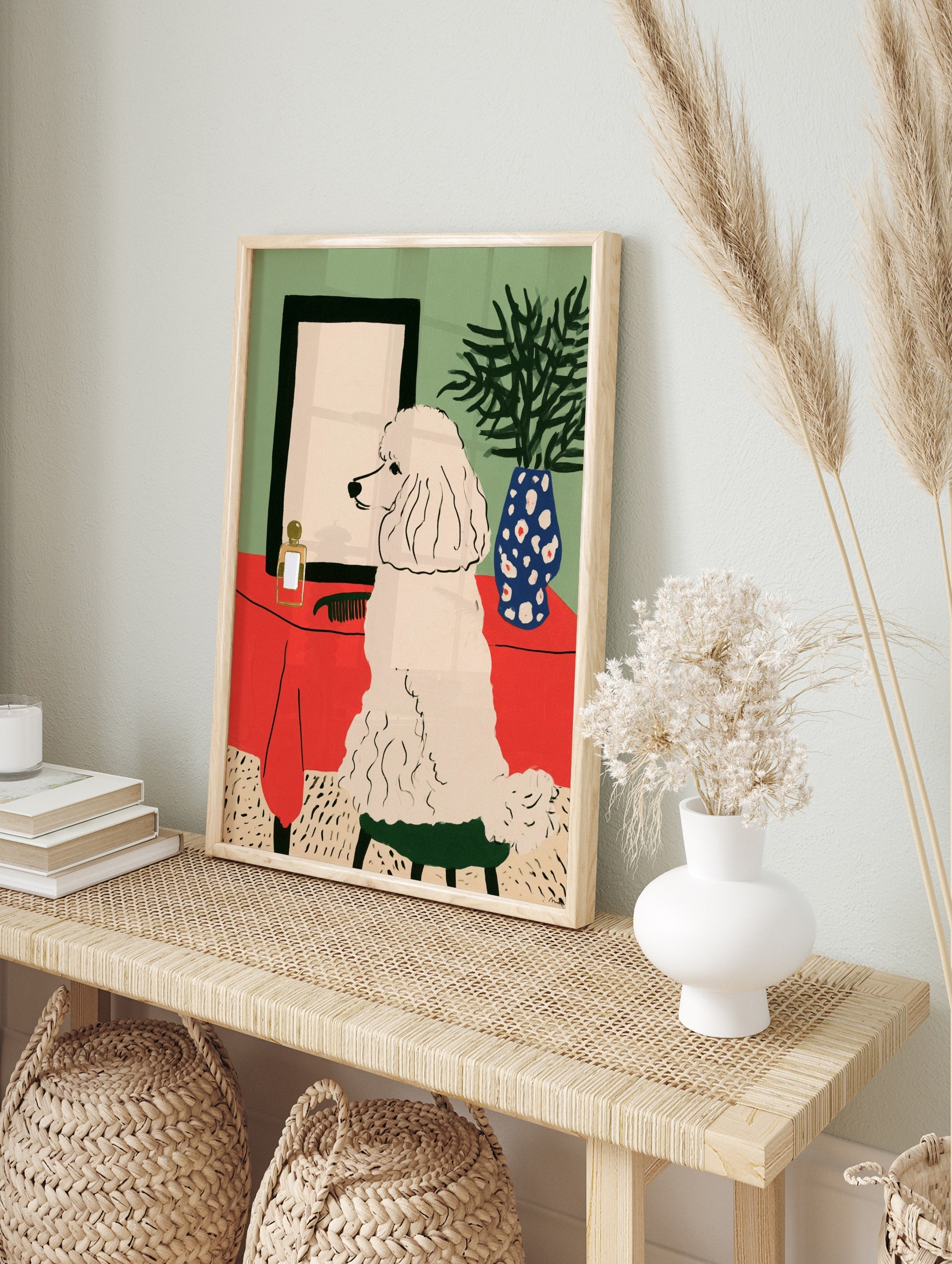 Illustrative art print of a white poodle sitting on a green stool before a mirror on a red, in an alternate framed mockup