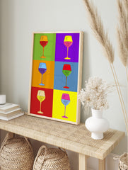 Colorful Pop Art grid featuring six illustrative wine glasses with different colored liquids and backgrounds, in an alternate