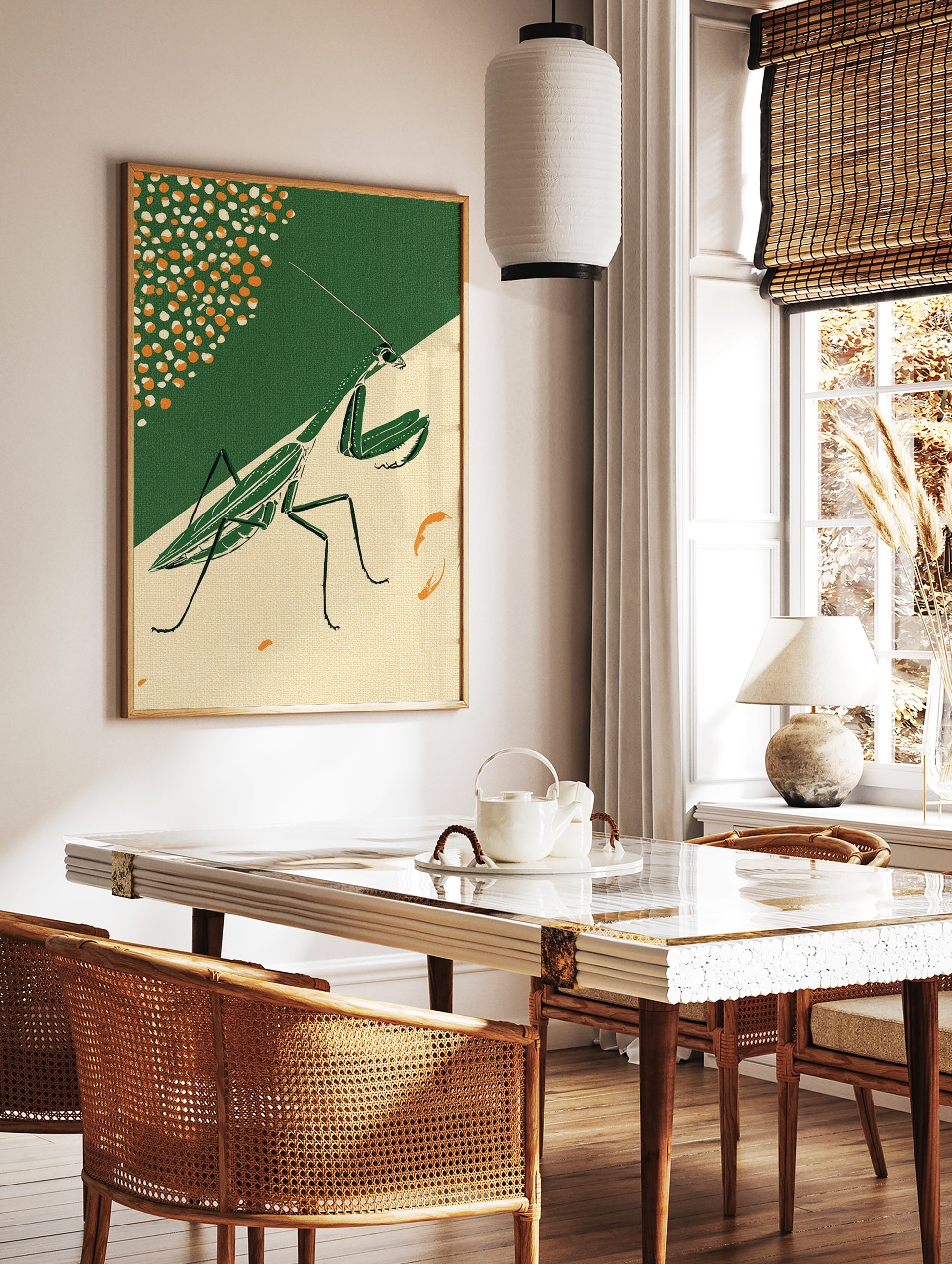 Illustrative praying mantis wall art in green on a split dark green and beige background with, in a styled room mockup