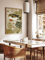 Illustrative art print of a spotted pufferfish with orange fish and coral in earthy tones, portrait, in a styled room mockup
