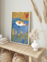 Ukiyo-e style pufferfish art print with gold fish, red fins, blue water, wooden posts, and, in an alternate framed mockup